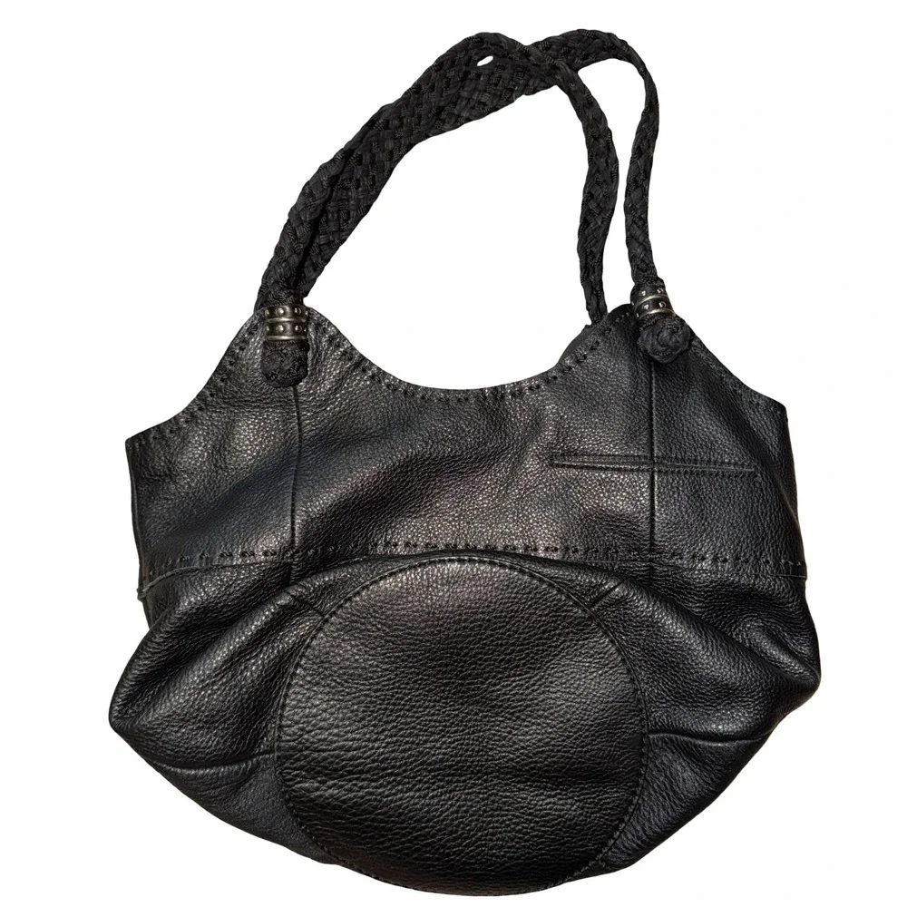 The Sak Indio black leather hobo bag, braided shoulder straps